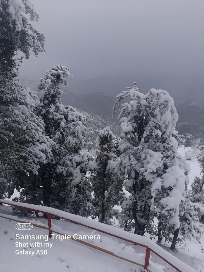 Dev Bhoomi Resort คานาตัล ภายนอก รูปภาพ